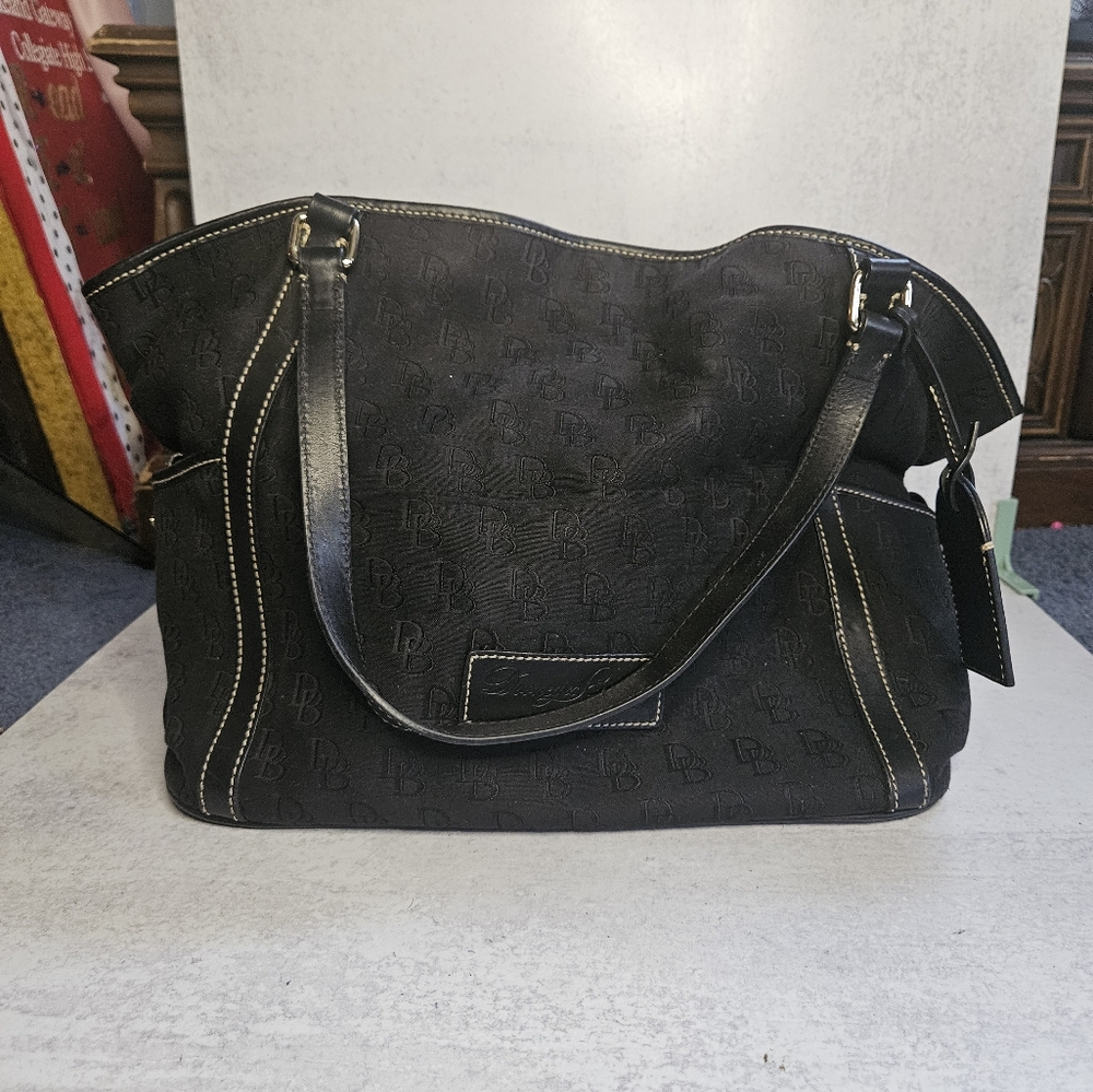 Dooney And Bourke Handbag Black Double Handle Canvas Monogram outer side pockets